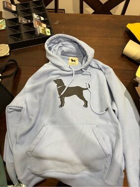 The Black Dog Light Blue Hoodie with Black Dog Silhouette